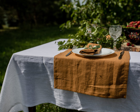 mustard linen table runner made from natural linen, handmade, on white table with greenery decor